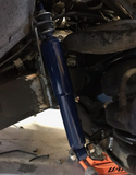 Universal front shock relocation kit